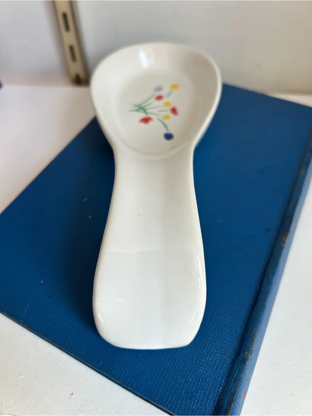 White Ceramic Spoon Rest with Colorful Floral Motif